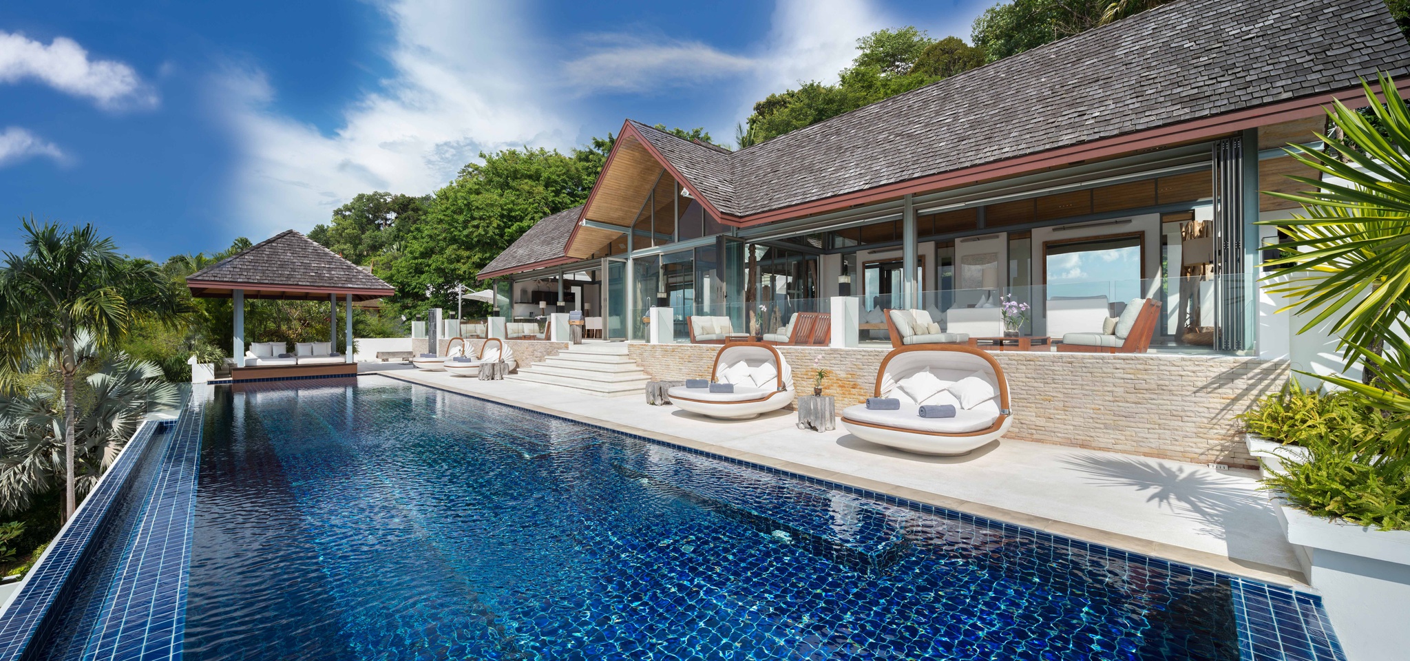 infinity pool in modern thail luxury villa in thailand
